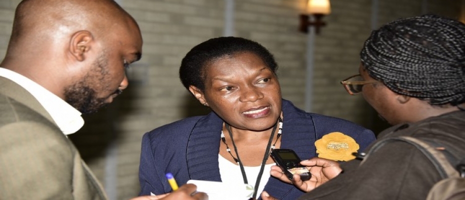 Clerk to Parliament Jane Kibirige talking to journalists
